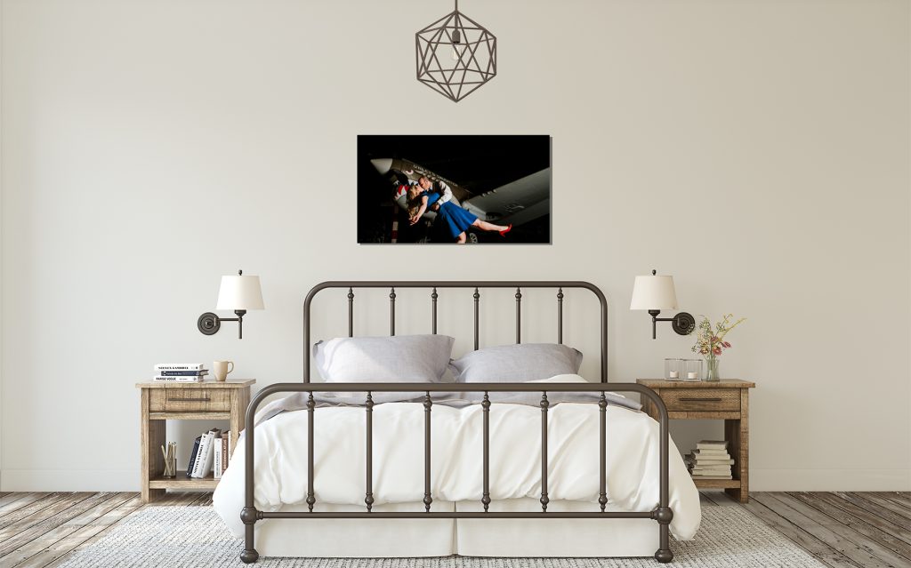 A canvas hanging over a metal bed example of Engagement Photos in Cle Elum 