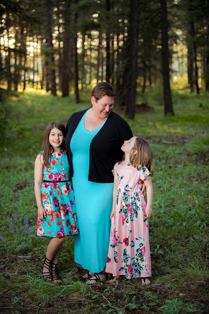 mother looking at the two daughters from family photography session in cle elum by Mary Maletzke Photography