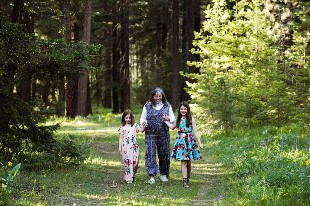 grandmother walking with her two grandaughters during a family photography session by Mary Maletzke photographer in Cle Elum