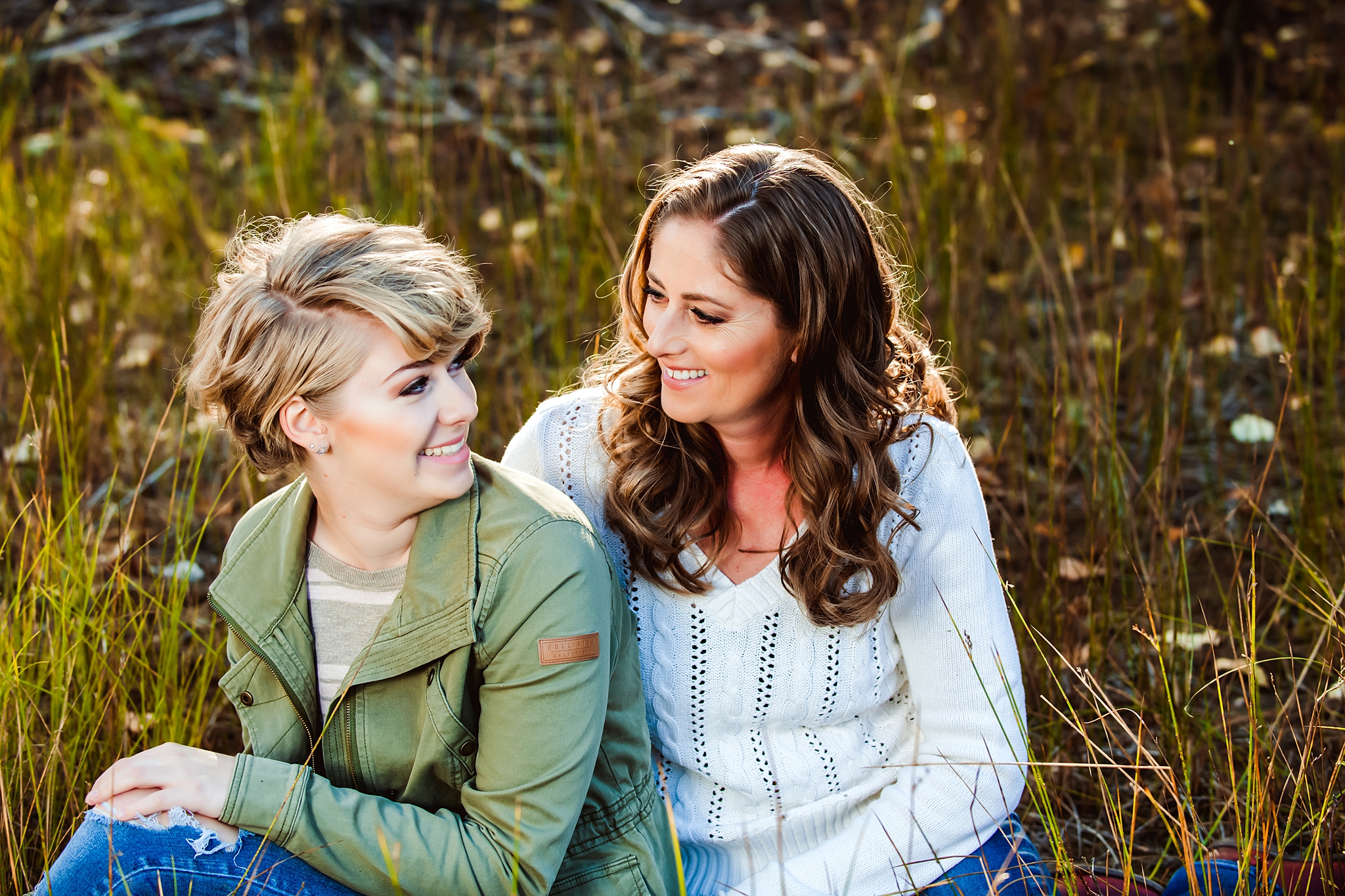 Mother and Daughter in a field of wild flowers during a Cle Elum Senior Photography Session