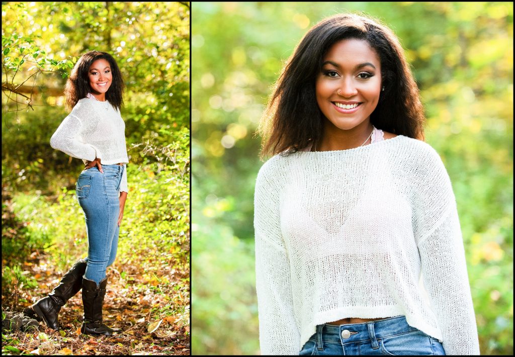 Senior photo of a girl in a crop sweater and jeans
