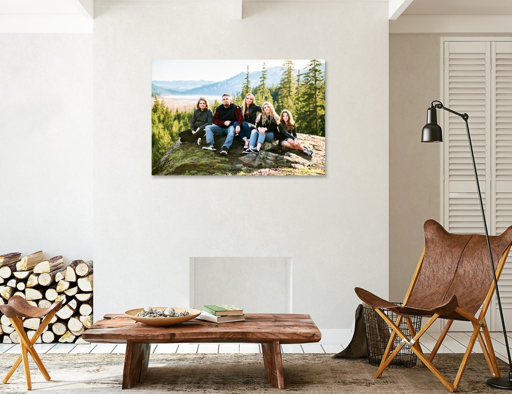 Styled sitting area with family wall art by Mary Maletzke Photography hanging on the wall