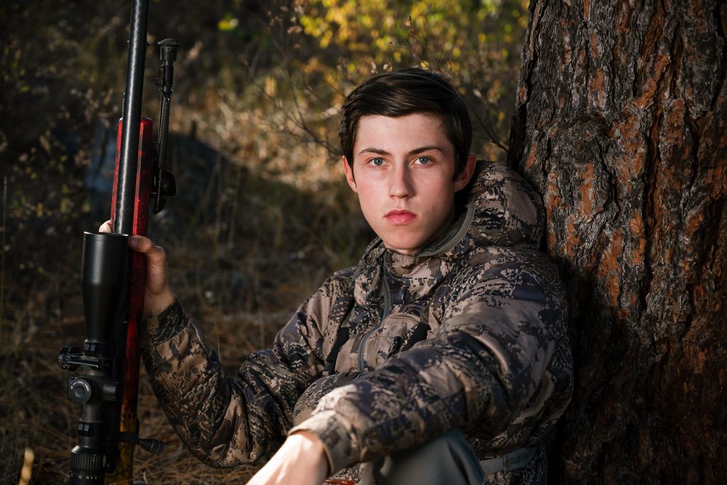 Photo of young hunter wearing camouflage in the central cascades of Washington