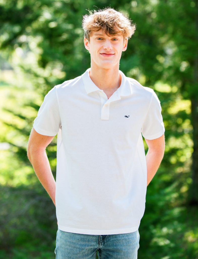 Portrait of Teenage Boy in white polo taken by Family Photographer in Suncadia 