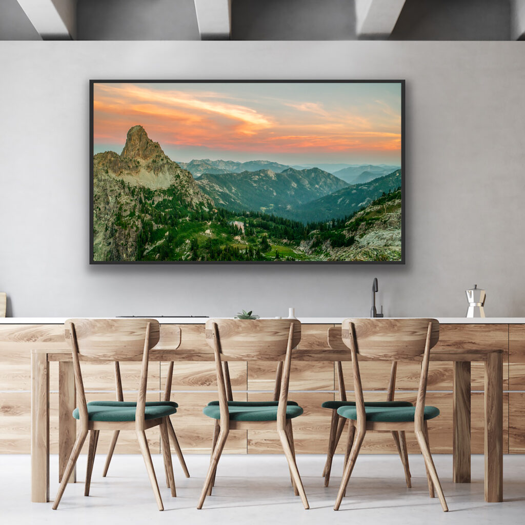 Feather + Larch's Wall Art Collection. A framed photograph of Cathedral Rock and Peggy's Pond hang above the dining room table and 6 dining chairs